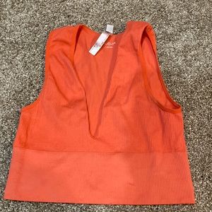 ORANGE PLUNGE TANK TOP. URBAN OUTFITTERS.